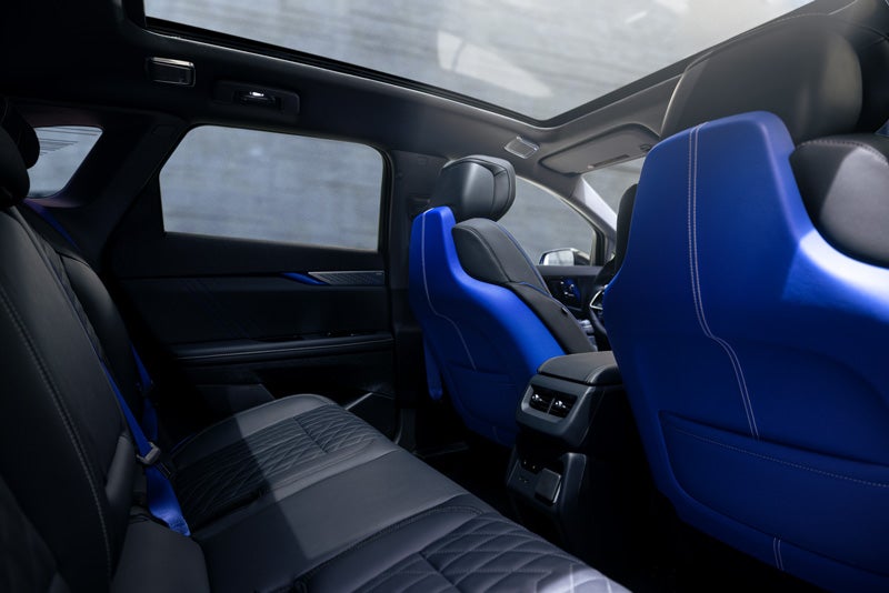Back Seat View of the 2026 OPTIQ-V Blue Front Seats, Sun Roof, and Interior | Clay Cooley Cadillac in Mesquite TX